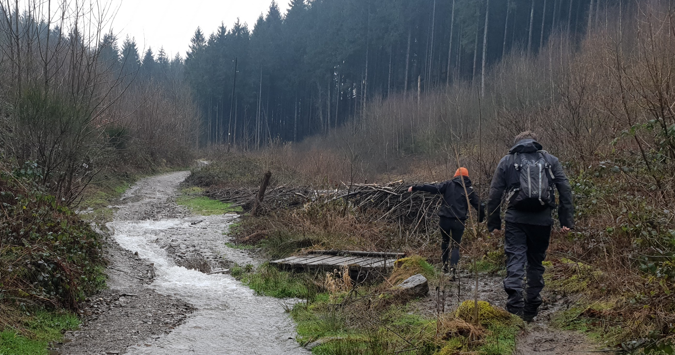 Aline & Geert trudging muddled waters.